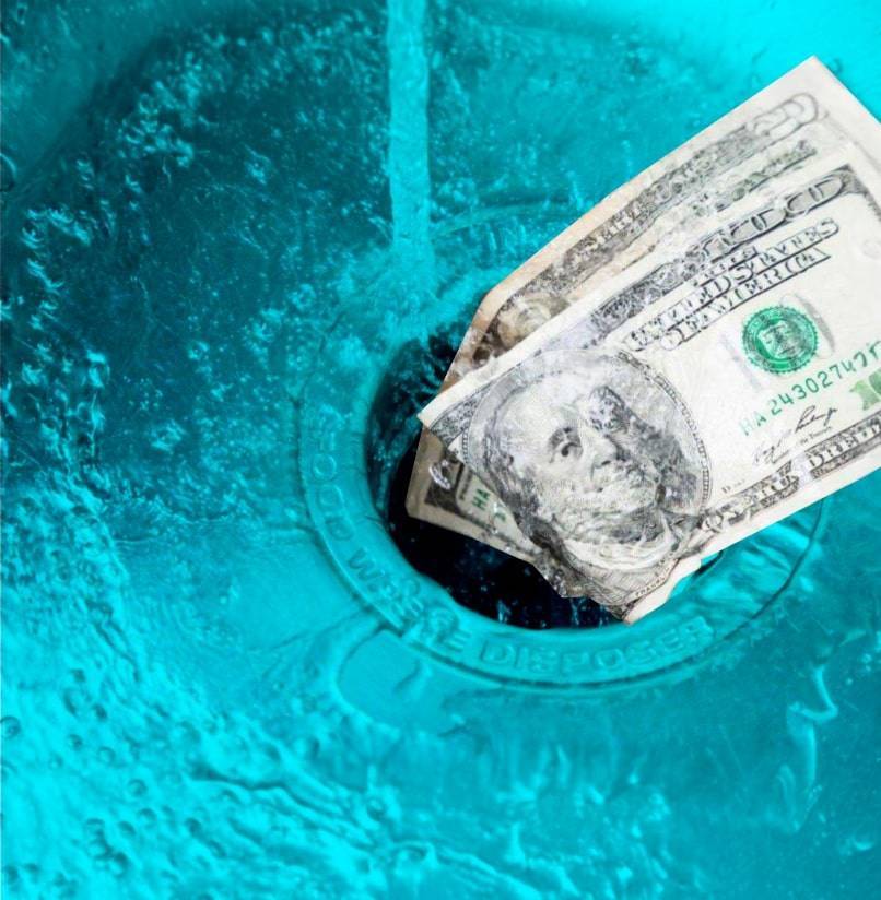 Tinted Teal sink with money being flushed down the drain.