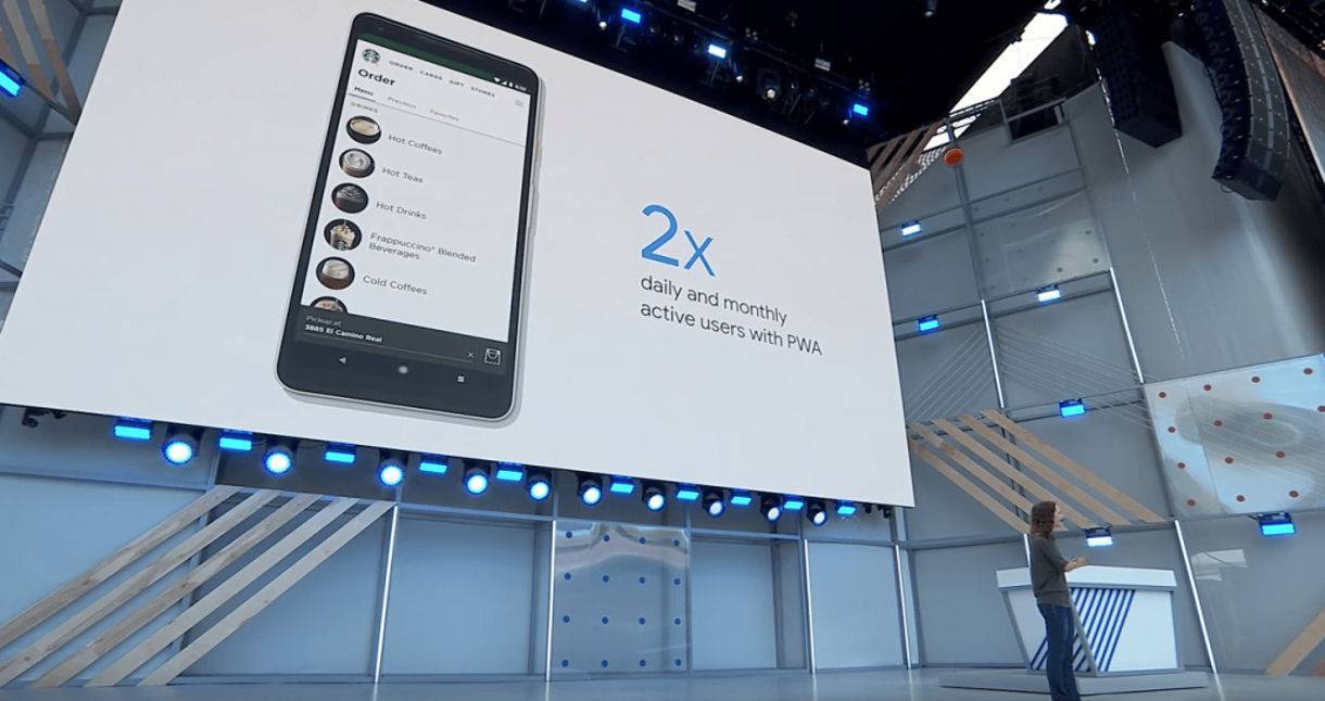 programmer on stage at Google IO 2018 speaking about the Starbucks Progressive Web App